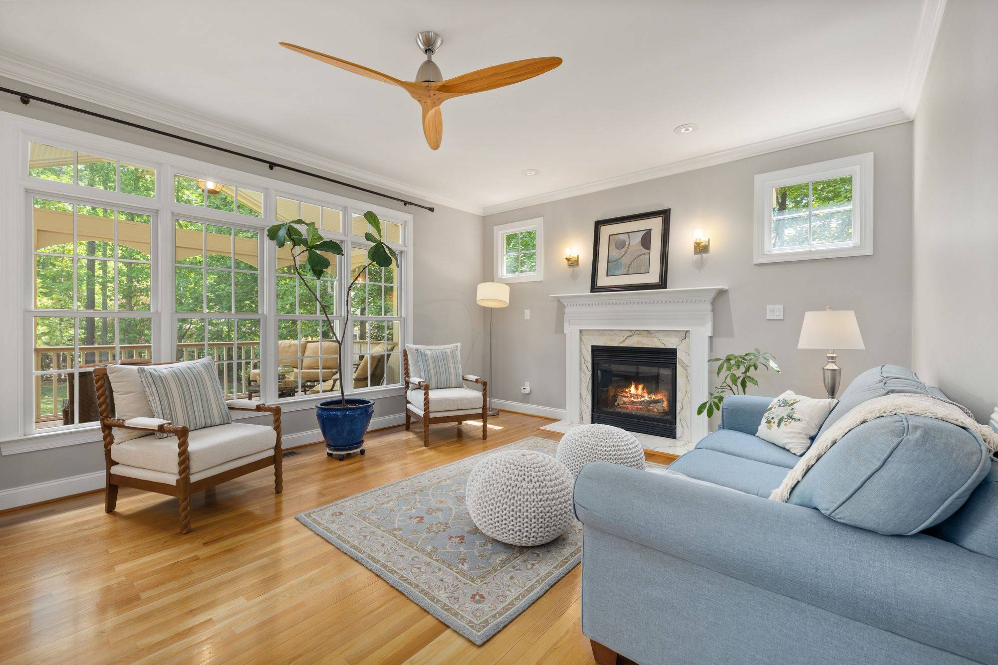Sunlit living room opening onto a garden
